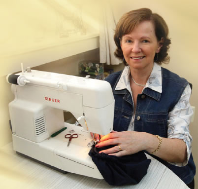 Ursula-at-work-creating-headwear